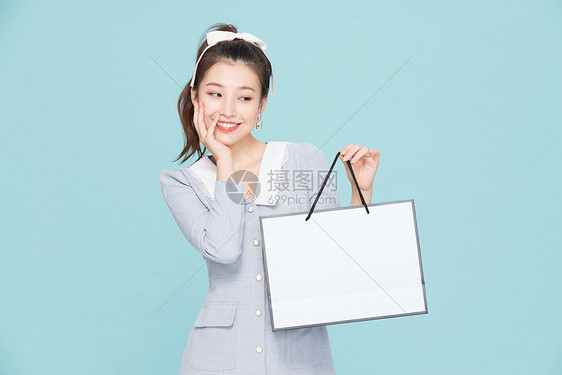 韩系可爱少女促销购物图片