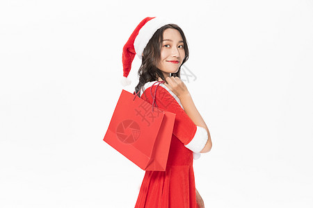 圣诞美女购物拎购物袋高清图片