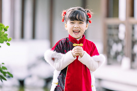 蹲着的古风女孩汉服中国风可爱儿童过新年拜年背景