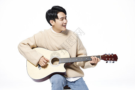 韩系阳光男生弹吉他形象图片
