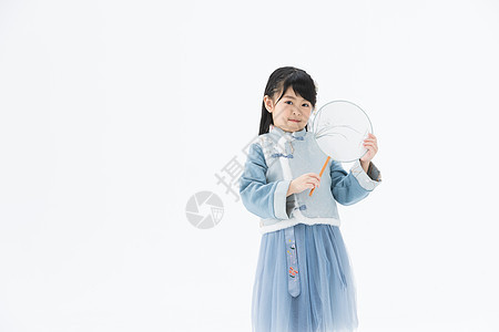 手拿团扇穿着汉服的小女孩图片