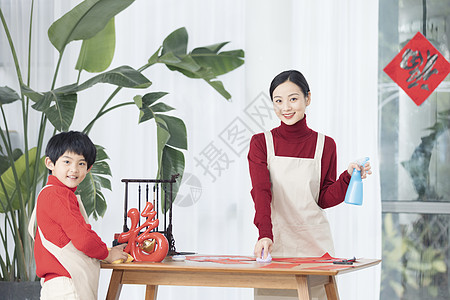 春节打扫春节母子家庭大扫除背景