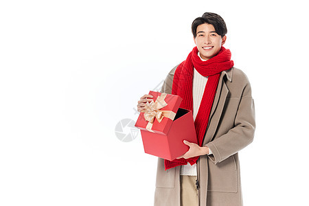 新年男性抱着礼物盒过年图片