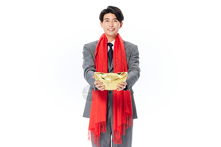 男性捧着金元宝迎新年图片