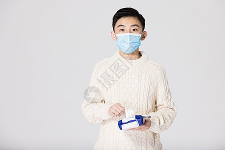 儿童肖像青少年儿童戴口罩手部清洁消毒背景