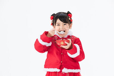 中国节品尝汤圆的可爱小女孩背景