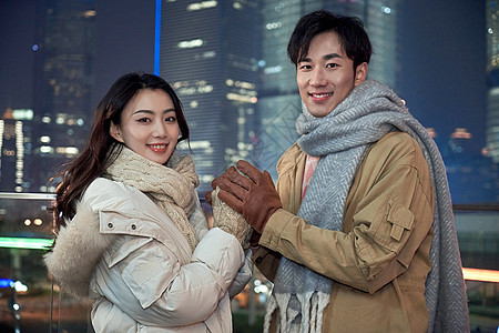 冬天爱情夜晚冬季情侣亲密暖手背景