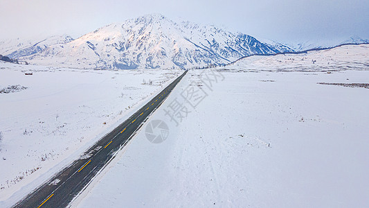 白雪道路新疆冬季喀纳斯雪山公路道路背景