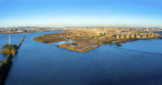 全景航拍昆明草海隧道口滇池城市风光图片