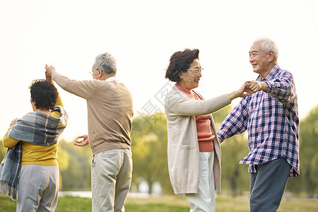 幸福老人老年人公园跳广场舞背景