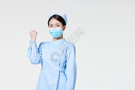 护士戴着口罩做加油动作图片