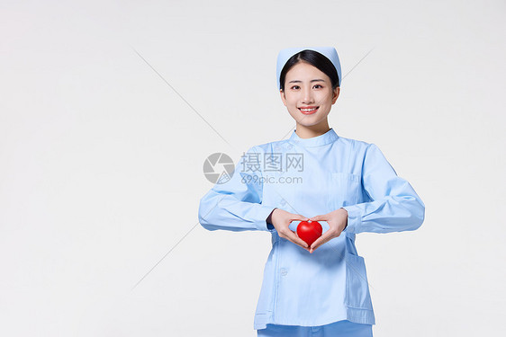 双手比心的护士形象图片