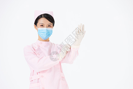 戴手套的医护人员图片