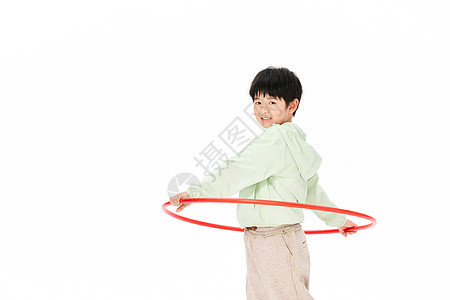 喜欢运动的小男孩转呼啦圈背景图片