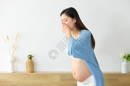 捂着嘴的孕妇反胃的人图片