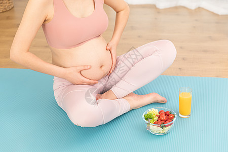 孕期锻炼居家孕妇做瑜伽背景