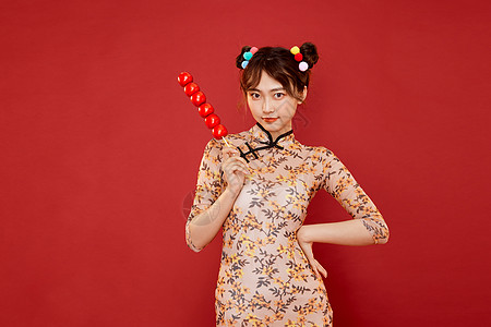 国潮化妆品中国风传统旗袍美女拿冰糖葫芦背景