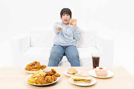 甜食暴饮暴食的胖女孩享受生活背景