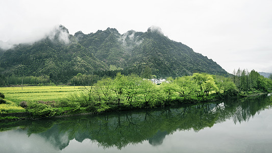 水墨稻田皖南齐云山下中国风山峦溪流背景