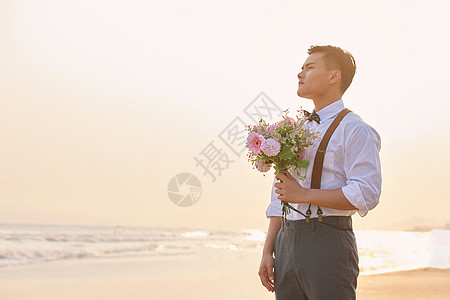 男士造型年轻男士手拿手捧花背景