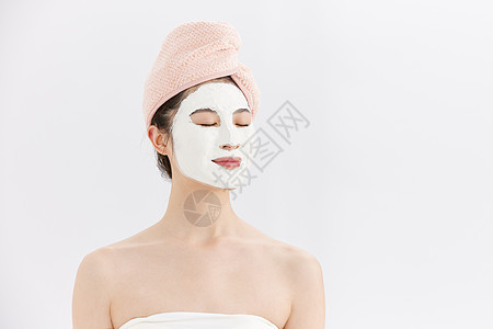 清洁皮肤年轻女性面部护理背景
