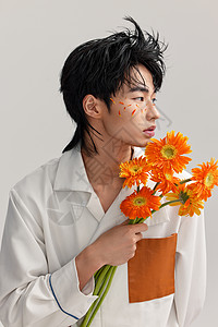 扶郎花时尚妆面男性与鲜花背景