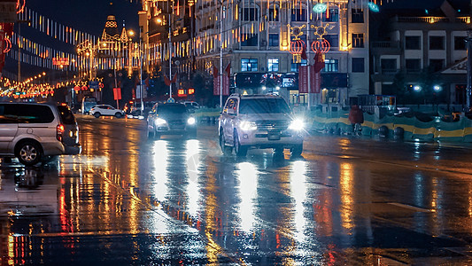 雨天城市城市雨夜车灯背景