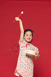 古风筷子夹着小笼包的小女孩图片