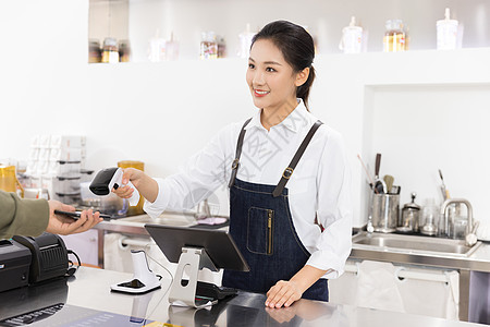 饮品店女性服务员扫码收款奶茶店高清图片素材