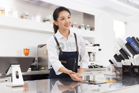 饮品店女性服务员服务点单图片