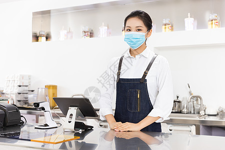 饮品店女性服务员戴口罩服务图片