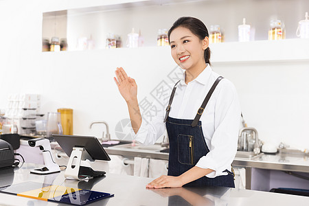 饮品店前台女性服务员图片