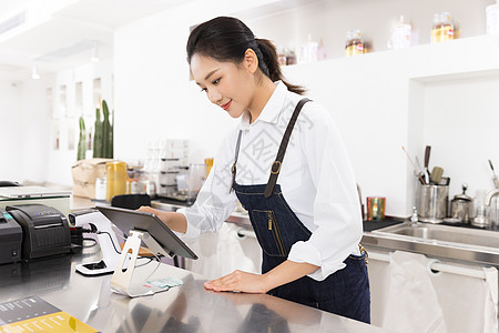 饮品店女性服务员服务点单图片