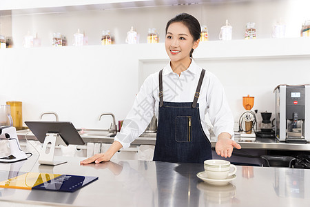 饮品店前台女性服务员图片