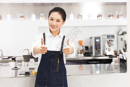 饮品店前台女性服务员点赞图片