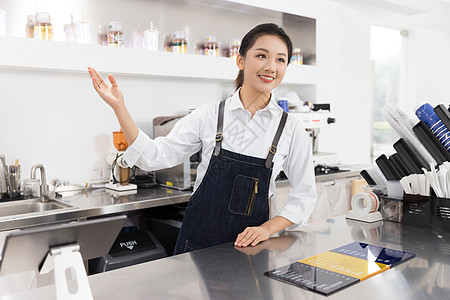 饮品店前台女性服务员图片