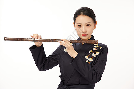 国潮古风美女手拿笛子图片素材