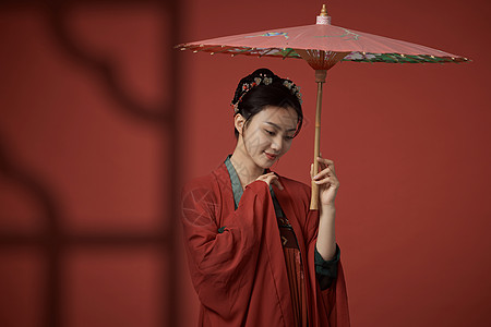 古典扇子手拿油纸伞的中国风古装美女背景