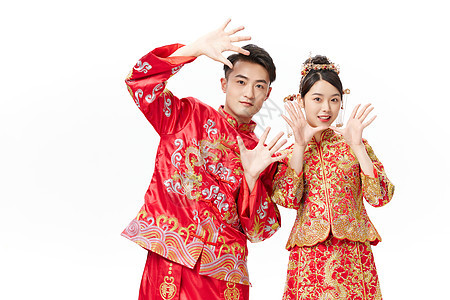俏皮中式传统结婚照背景图片