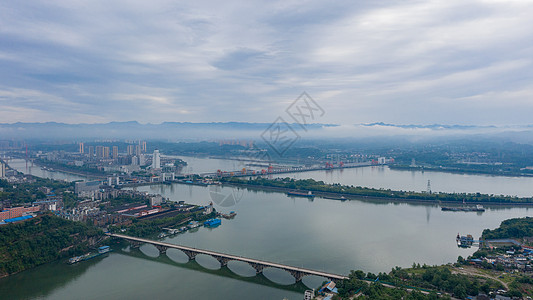 雨后城市雨后的葛洲坝背景