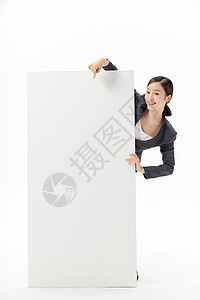 手扶白板表情惊讶的职场商务女性背景图片