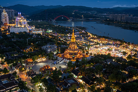 西双版纳告庄双景星空夜市夜景背景图片