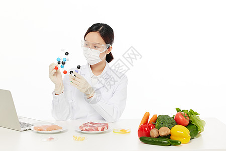 分子结构图片女性营养师研究食物分子结构背景