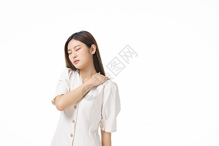 肩膀不适的年轻女性背景图片