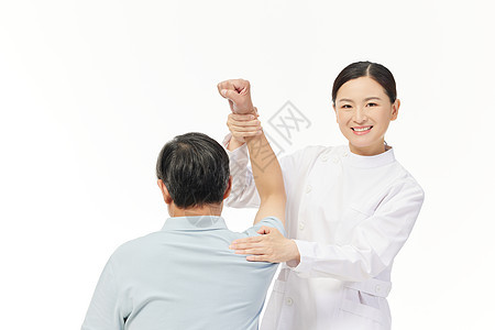 护士帮助老人放松肢体复健图片