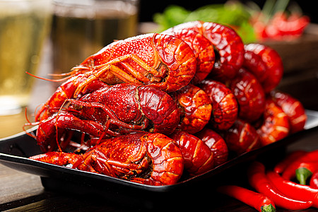 红色辣椒叠在一起的麻辣龙虾背景