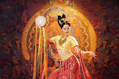 水壶鼓中国风敦煌美女手举风铃鼓跳舞背景