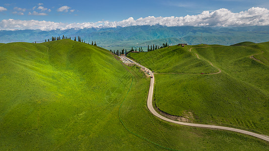 新疆自然风光航拍5A景区夏季绿色新疆那拉提大草原自然风光背景