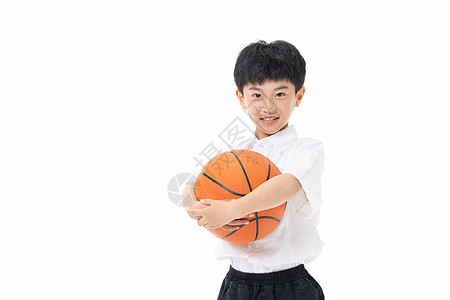 抱着篮球的小男孩图片