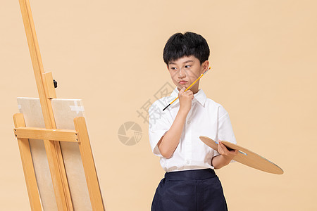 学习绘画遇到瓶颈的小男孩图片